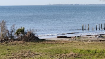 On the beach, sun loungers