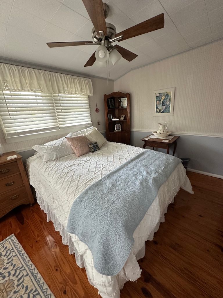 Primary antique bedroom-queen-sized bed.  New mattress. 