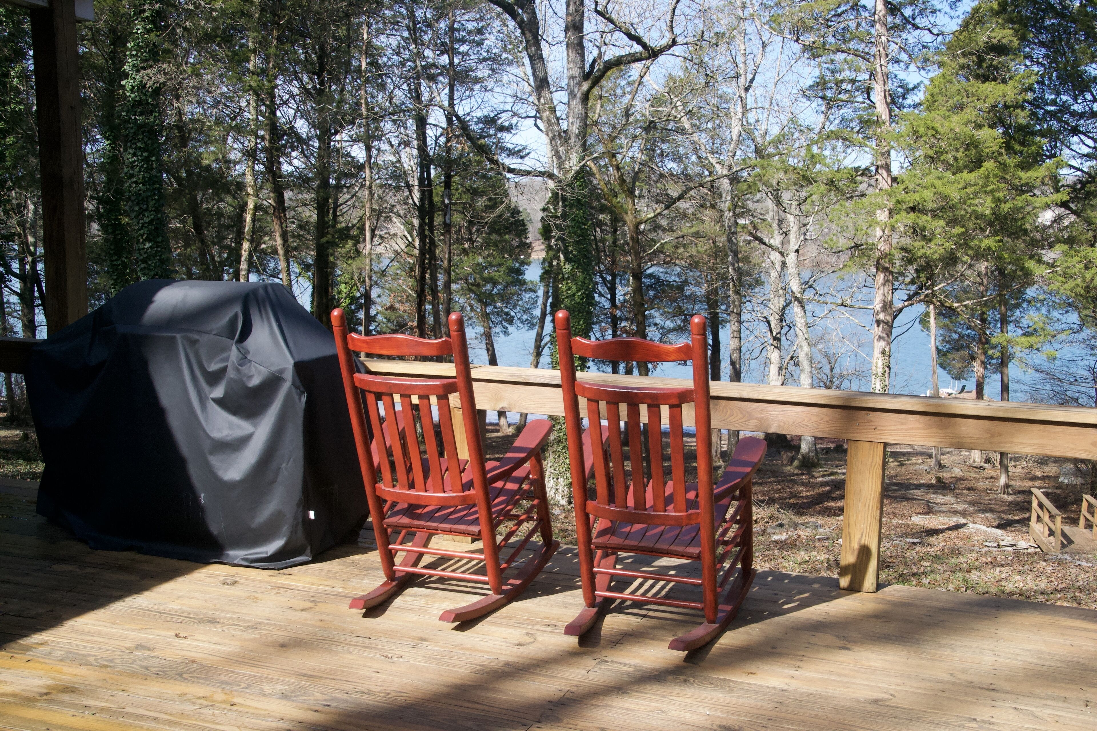 Enjoy the peace of relaxing here. Covered gas grill on left.