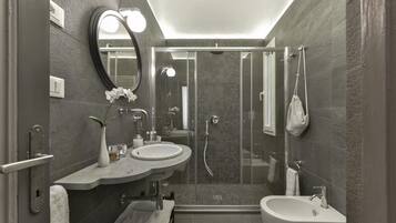 Shower, jetted tub, hair dryer, bidet