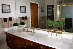 Combined shower/tub, hair dryer, towels, soap