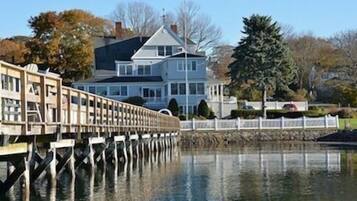 Enjoy breathtaking views from the expansive balcony overlooking the serene water below.
