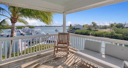 Finest location in Coral Lagoon. End unit with bay views and boat slip!