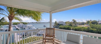 Finest location in Coral Lagoon. End unit with bay views and boat slip!