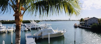 Finest location in Coral Lagoon.  End unit with bay views and boat slip! 