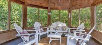 Cottage centrally located on island. Screened in porch with nature views and 2 golf carts