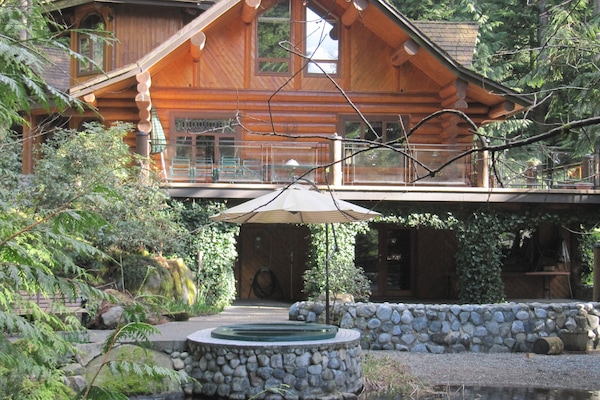 Enjoy the tranquil koi fish pond viewed from in the 10 person hot tub.