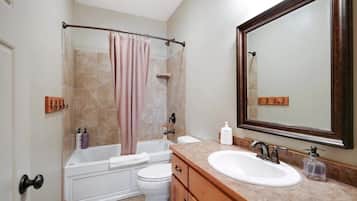 Hair dryer, towels, shampoo