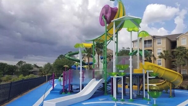 A water park with multiple slides and play structures.