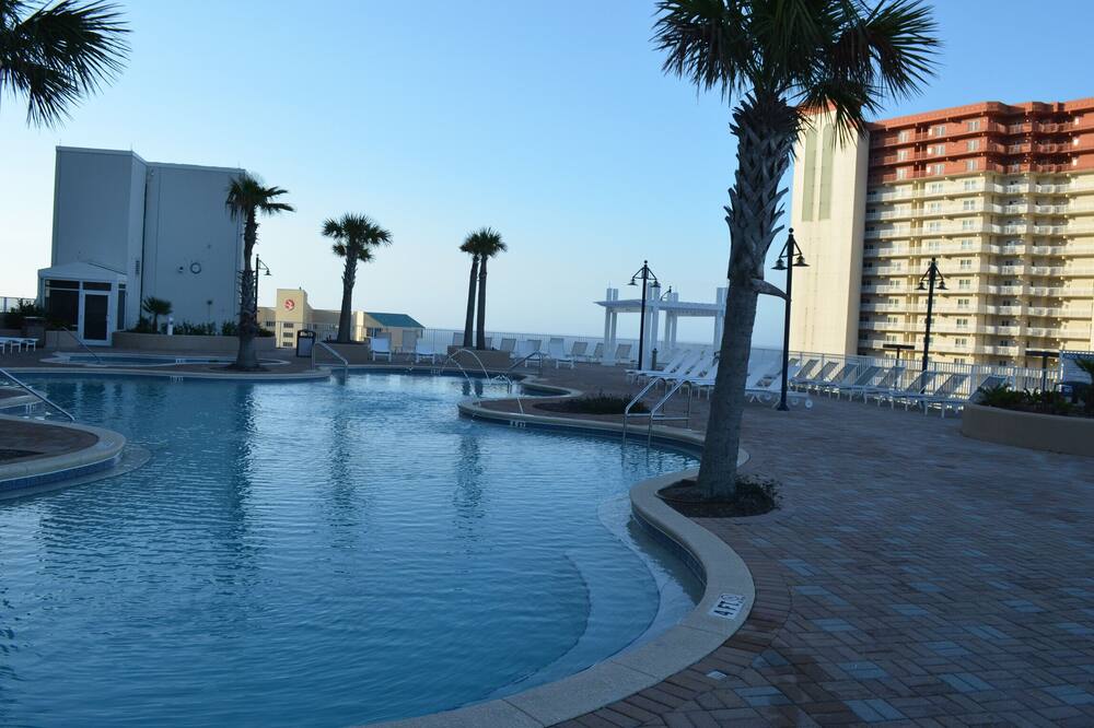Summer availability in beautiful 1BR condo right across the beach! 5 pools!