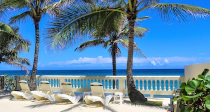 On Ocean & Sandy Beach-No steps to the beach! Air conditioned. Standby Generator