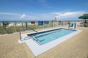 Enjoy a refreshing swim on the rooftop pool overlooking the ocean.