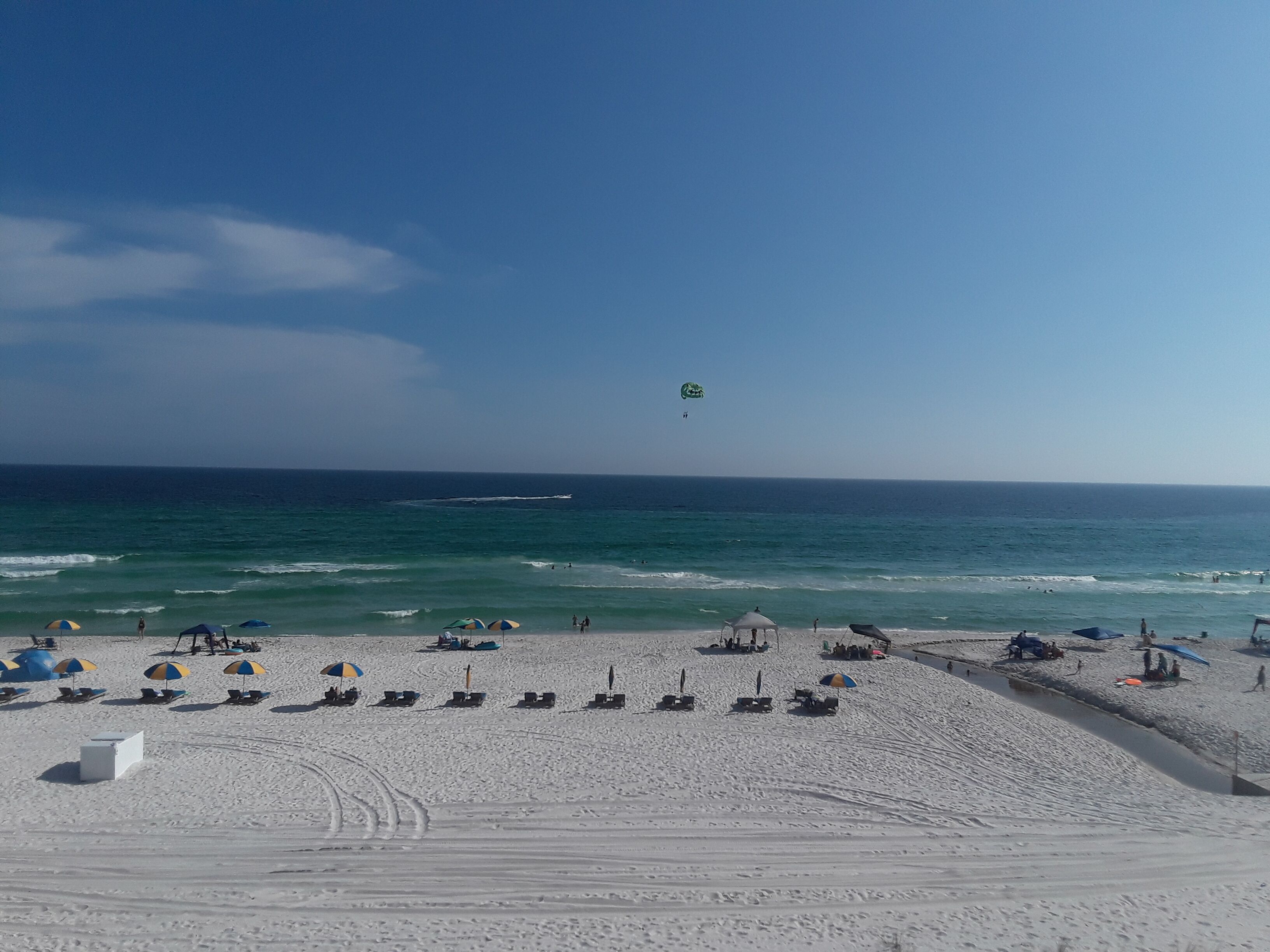 On the beach, sun-loungers