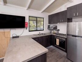 Superior Garden View 3 Bedroom Cabin | Private kitchen | Full-size fridge, microwave, oven, stovetop