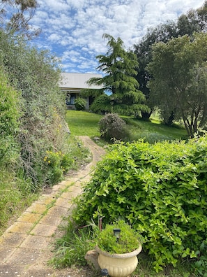 Pathway leading to the cottage 
If not wet you can drive around to the cottage 