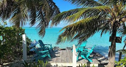 Step from your porch onto the soft white sand & crystal clear water.