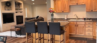 Open floor plan with a covered patio and fenced yard.