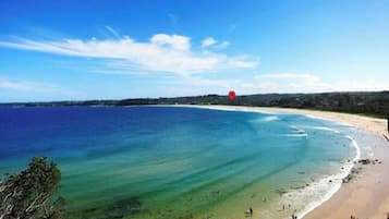 On the beach, sun loungers