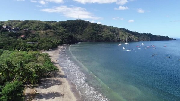 On the beach, sun-loungers, beach towels