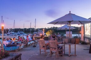Enjoy waterfront dining with comfortable seating and stunning views of the marina.