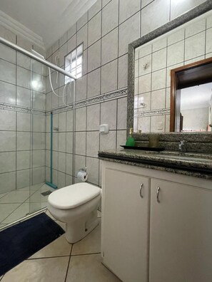 Shower, towels, soap, toilet paper