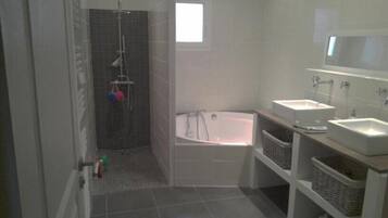 Combined shower/tub, hair dryer