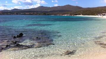On the beach, sun loungers