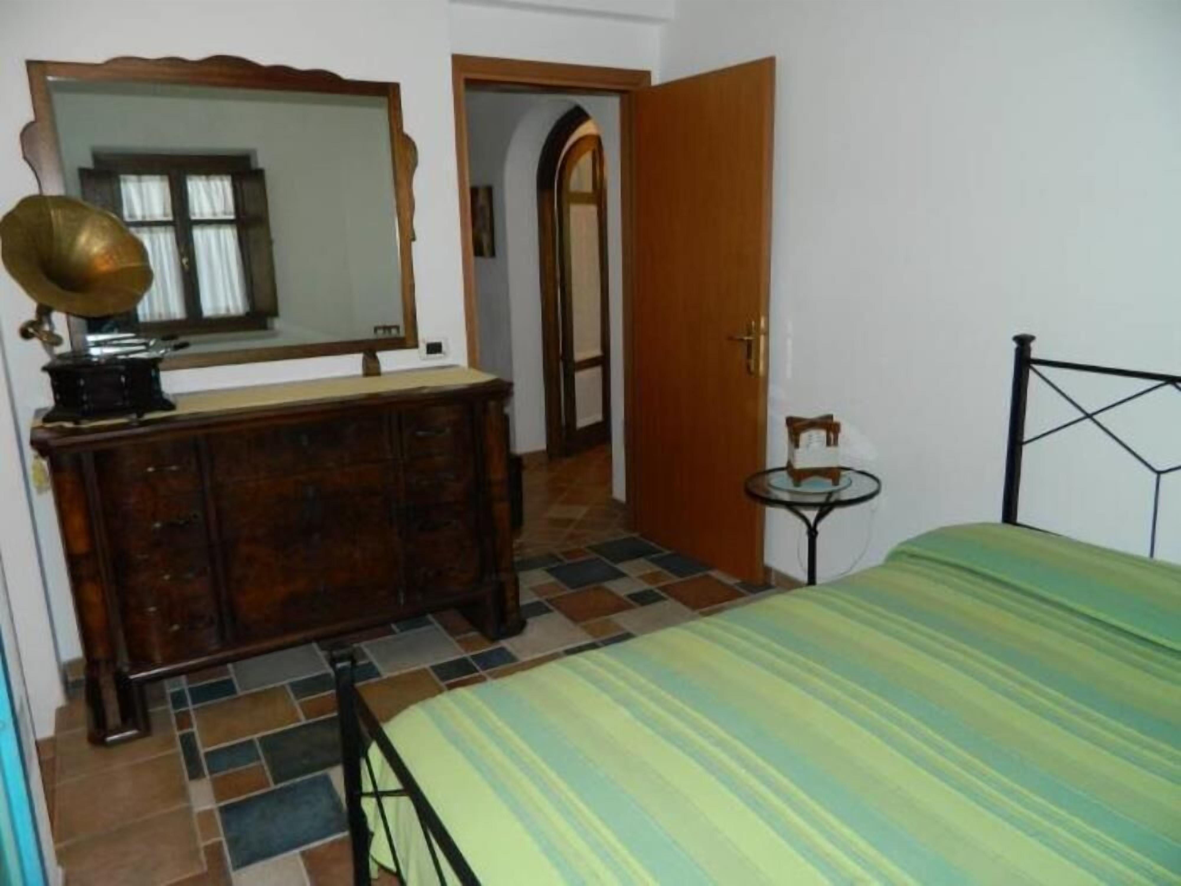 HOUSE WITH VERANDA AT A FEW STEPS FROM THE SEA