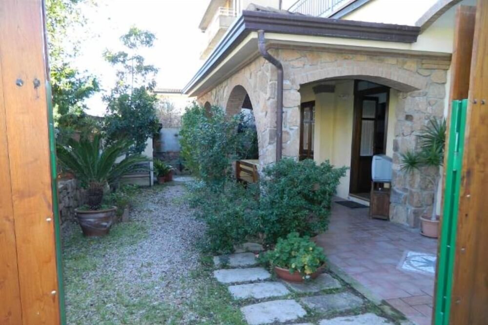 HOUSE WITH VERANDA AT A FEW STEPS FROM THE SEA