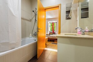 Hair dryer, towels, soap, shampoo