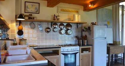 A little piece of heaven, set amongst stunning scenery of mountain and sea view