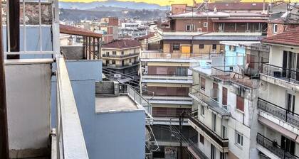 Traditional penthouse with fireplace and mountain views
