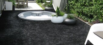 Design vacation studio, close to the sea with private garden, parking and bicycle storage