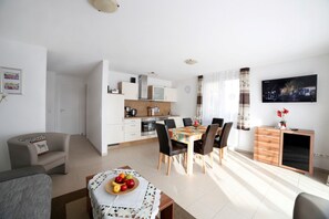 Smart TV, DVD player, table football, books