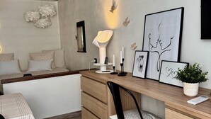 A cozy room with a wooden desk, a chair, a sofa, and a bed. - Le Nid des Baronnies: Rated 3-star vacation key! (Mirabel-Aux-Baronnies)