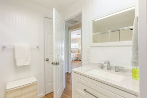 Bathtub, hair dryer, towels, soap