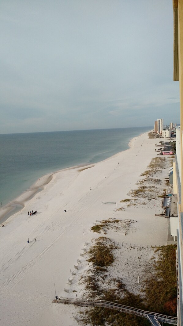 On the beach, sun-loungers