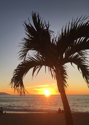 On the beach, sun-loungers, beach towels