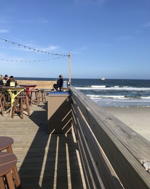 On the beach, sun-loungers