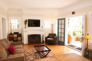 Smart TV, fireplace, DVD player, books