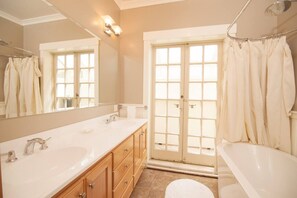 Combined shower/tub, hair dryer, towels, soap