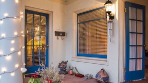 A front door with blue shutters, a light fixture, and potted plants. - "LOCATION! LOCATION! West Beach. Beach.  New Owner. (Santa Barbara)