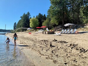 On the beach, sun-loungers, beach towels