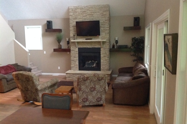 Beautiful gas fireplace with TV above.