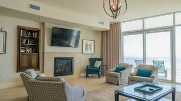 Flat-screen TV, fireplace, DVD player, stereo