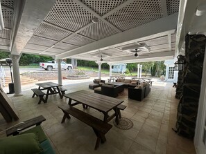 Outdoor dining - 7 Bed Lakefront Villa with a Pool and Pontoon boat available for rent! (Charlotte)
