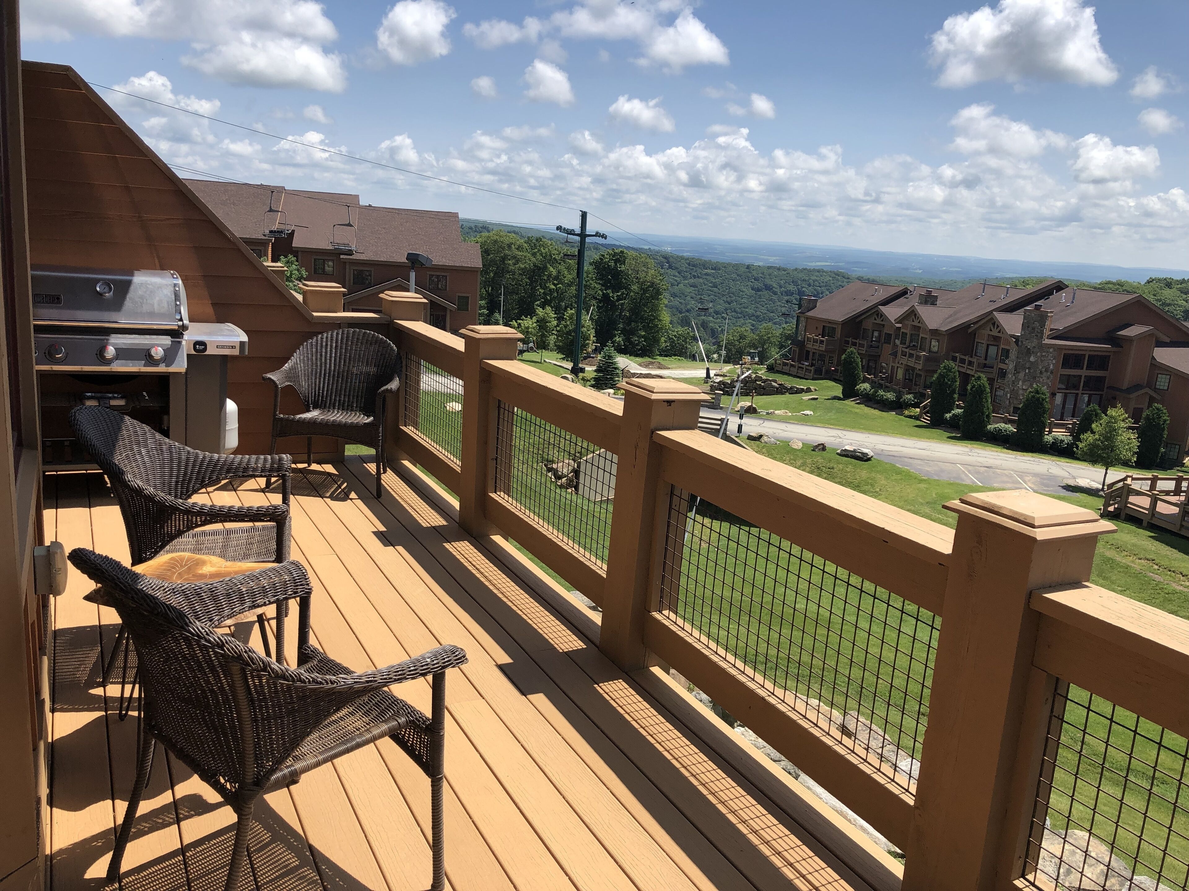 Main level back deck. Weber gas grill ready to go!  Lots of summer fun too.