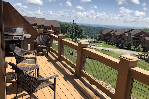 Main level back deck. Weber gas grill ready to go! Lots of summer fun too.