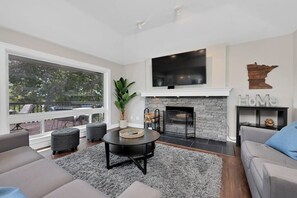 TV, fireplace, books, offices