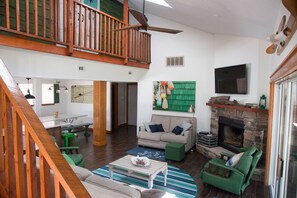 Smart TV, fireplace, DVD player, books